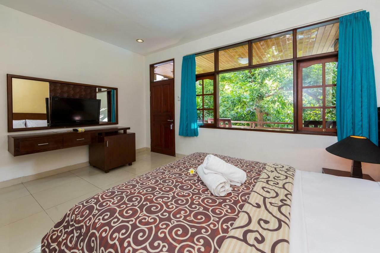 Legian Simpang Inn Hotel מראה חיצוני תמונה